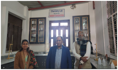 Visitors at the NASIM Foundation-supported chemistry lab at Alwar Mewat